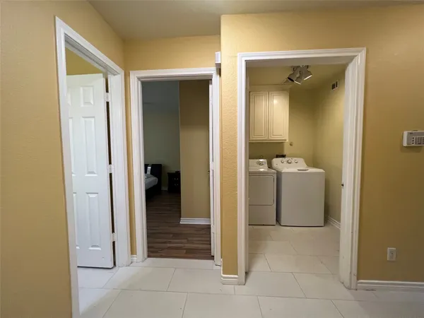a view of a bathroom from the hallway