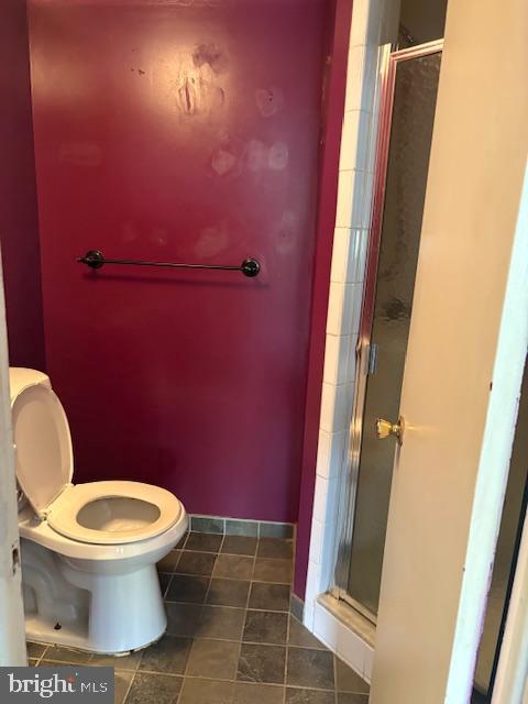 300 Byberry Road, Unit 202 Philadelphia, PA 19116 - Photo 25 of 32 a white toilet sitting next to a small bathroom