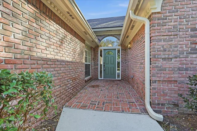 a view of front door of house with outdoor space