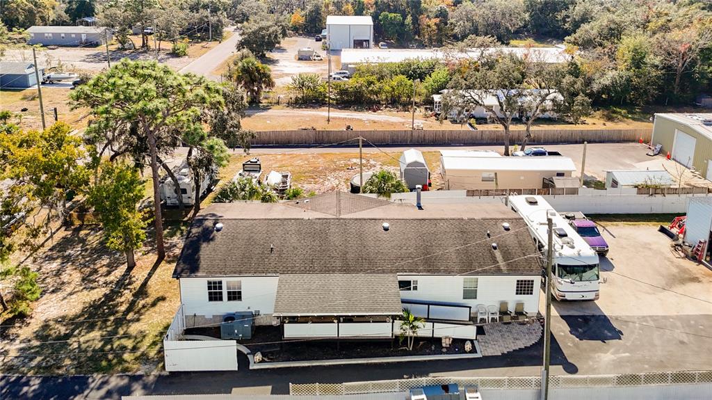 15821 Archer Street Hudson, FL 34667 - Photo 2 of 77 an aerial view of a house with a yard basket ball court