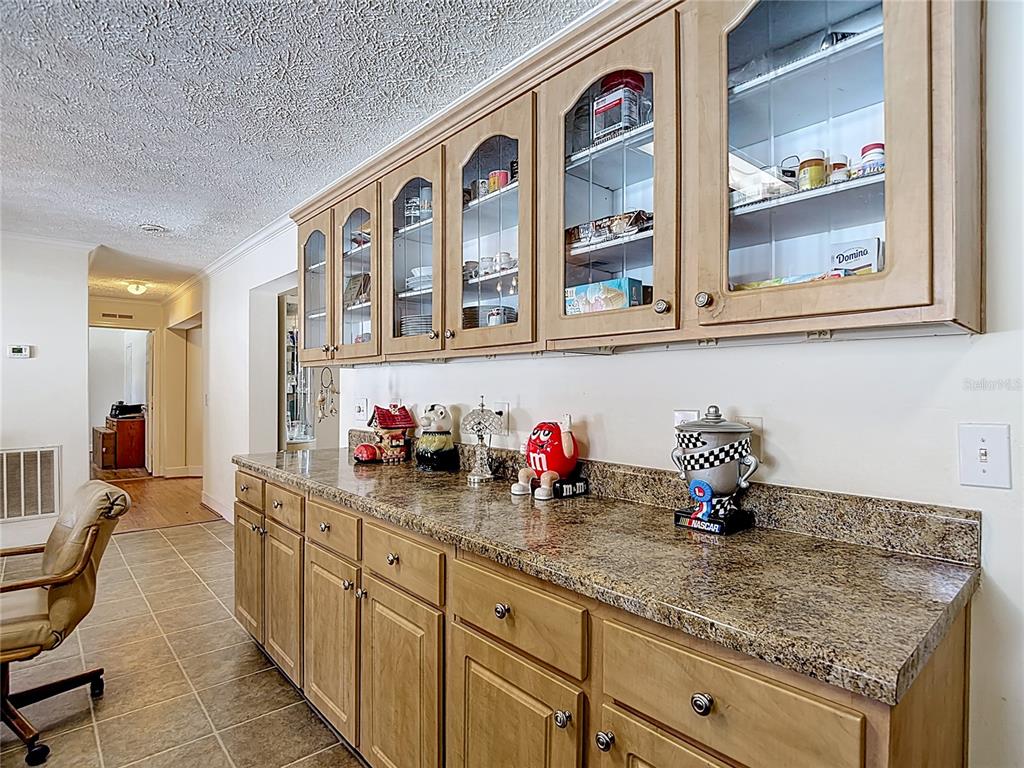 15821 Archer Street Hudson, FL 34667 - Photo 34 of 77 a kitchen with sink and cabinets