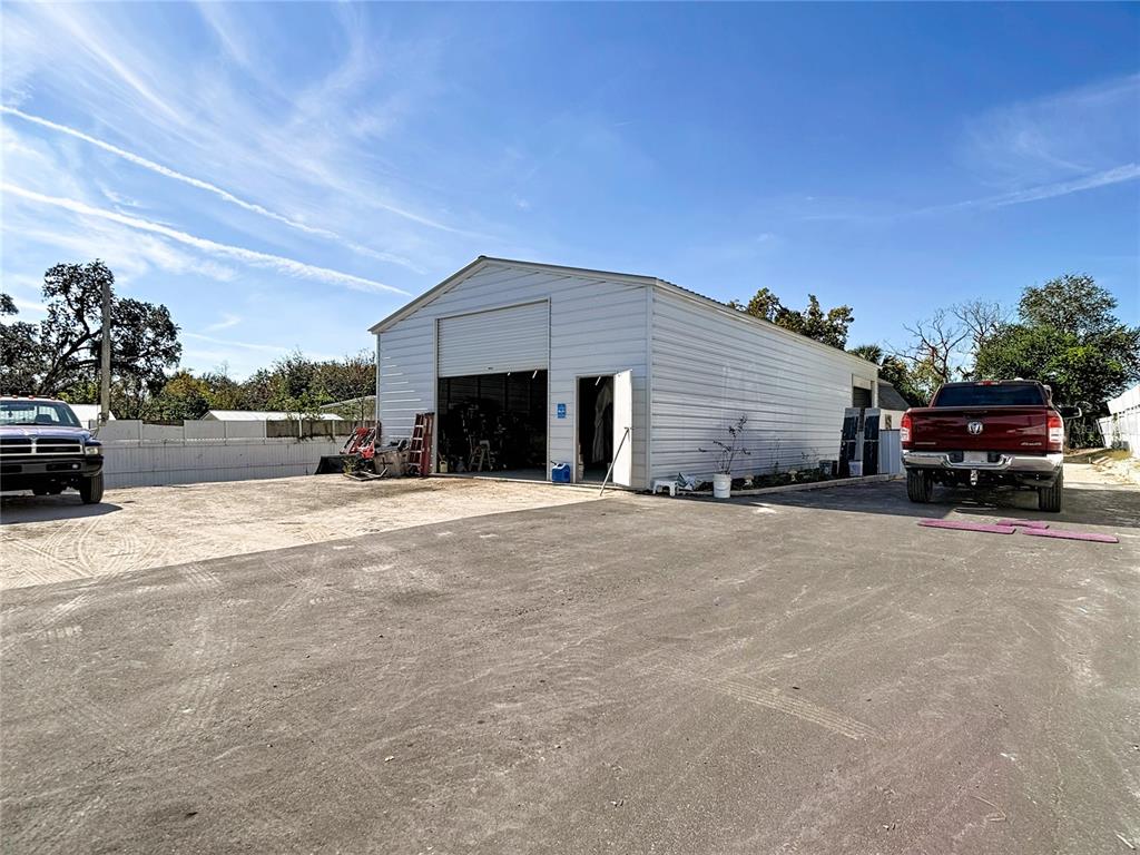 15821 Archer Street Hudson, FL 34667 - Photo 61 of 77 a view of a car parked in front of a house