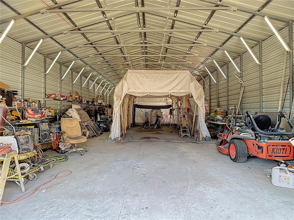 15821 Archer Street Hudson, FL 34667 - Photo 64 of 77 a view of a room with gym equipment