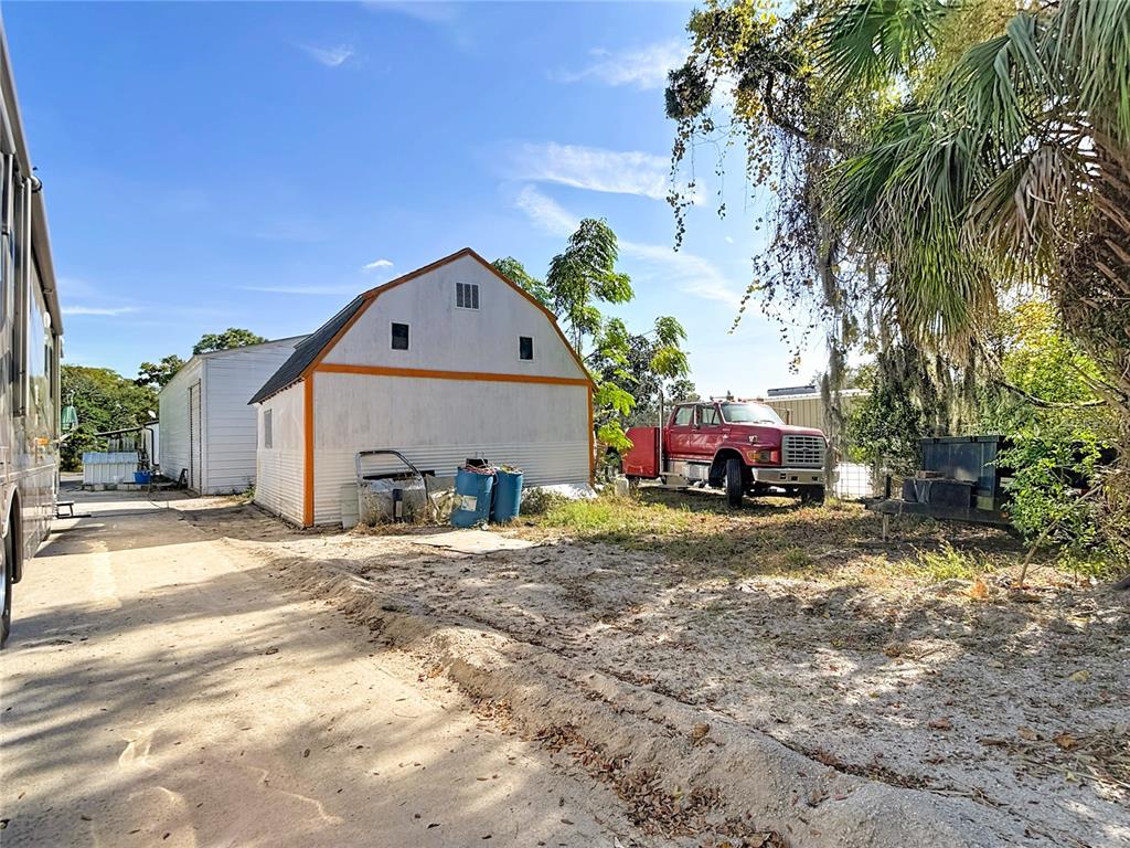 15821 Archer Street Hudson, FL 34667 - Photo 70 of 77 a view of a house with a patio