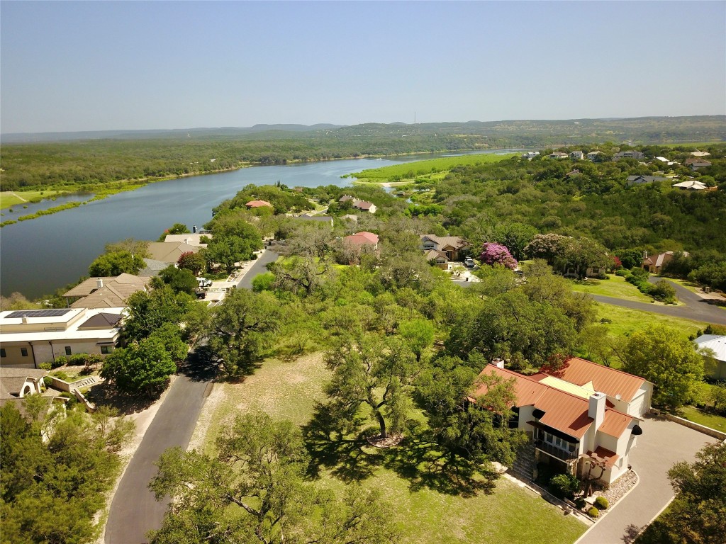 333 Quail Run Court Spicewood, TX 78669 - Photo 2 of 37 a view of lake view and mountain view