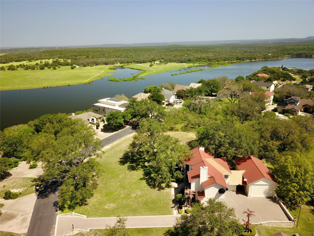 333 Quail Run Court Spicewood, TX 78669 - Photo 37 of 37 an aerial view of ocean with residential house and outdoor space