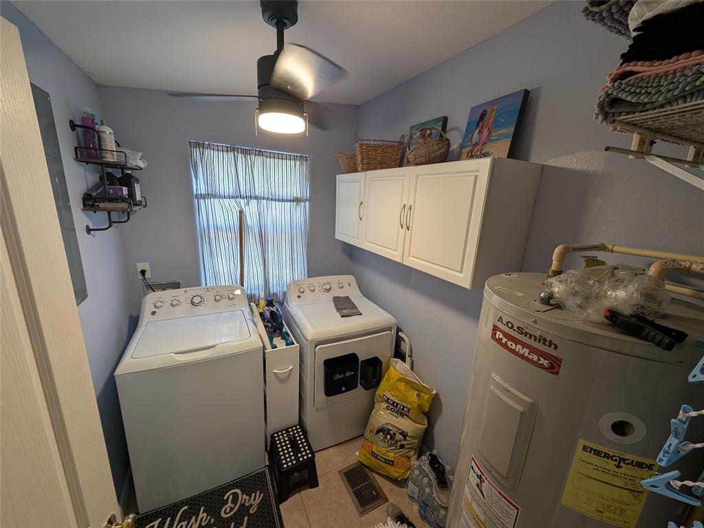 14730 Southeast 61st Street Road Ocklawaha, FL 32179 - Photo 44 of 88 a utility room with dryer and washer