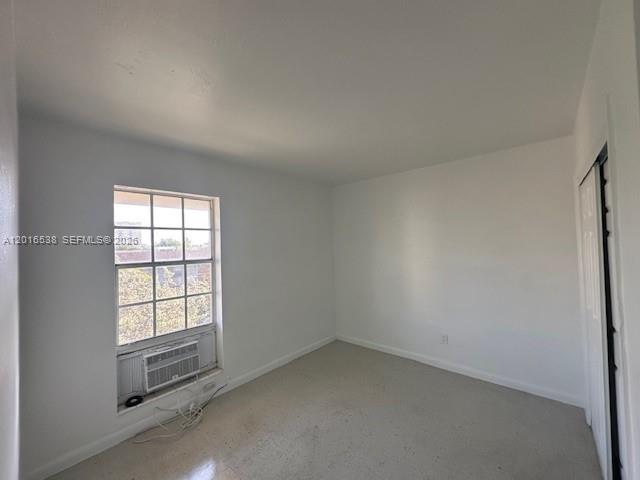 1400 Douglas Road, Unit 14 Coral Gables, FL 33134 - Photo 12 of 19 an empty room with a window