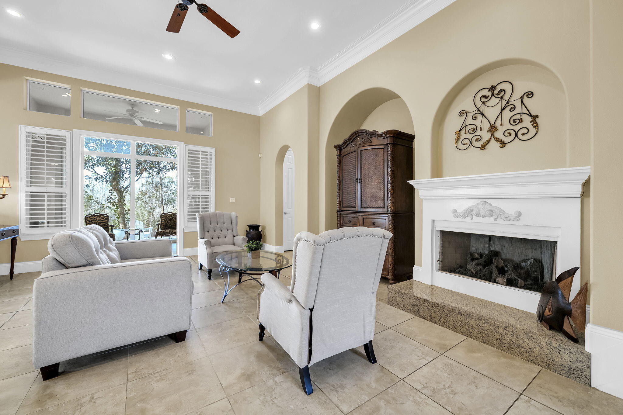 4595 Sailmaker Lane Destin, FL 32541 - Photo 11 of 50 a living room with furniture and a fireplace