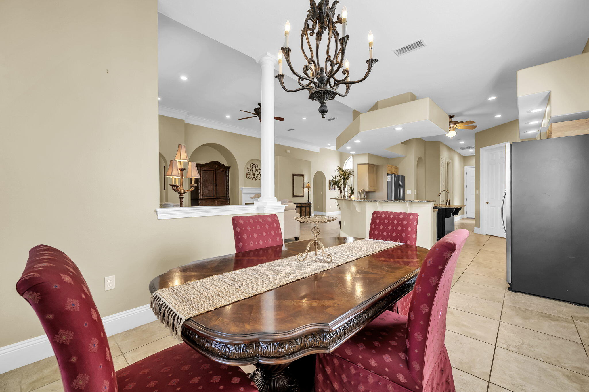 4595 Sailmaker Lane Destin, FL 32541 - Photo 13 of 50 a view of a dining room with furniture
