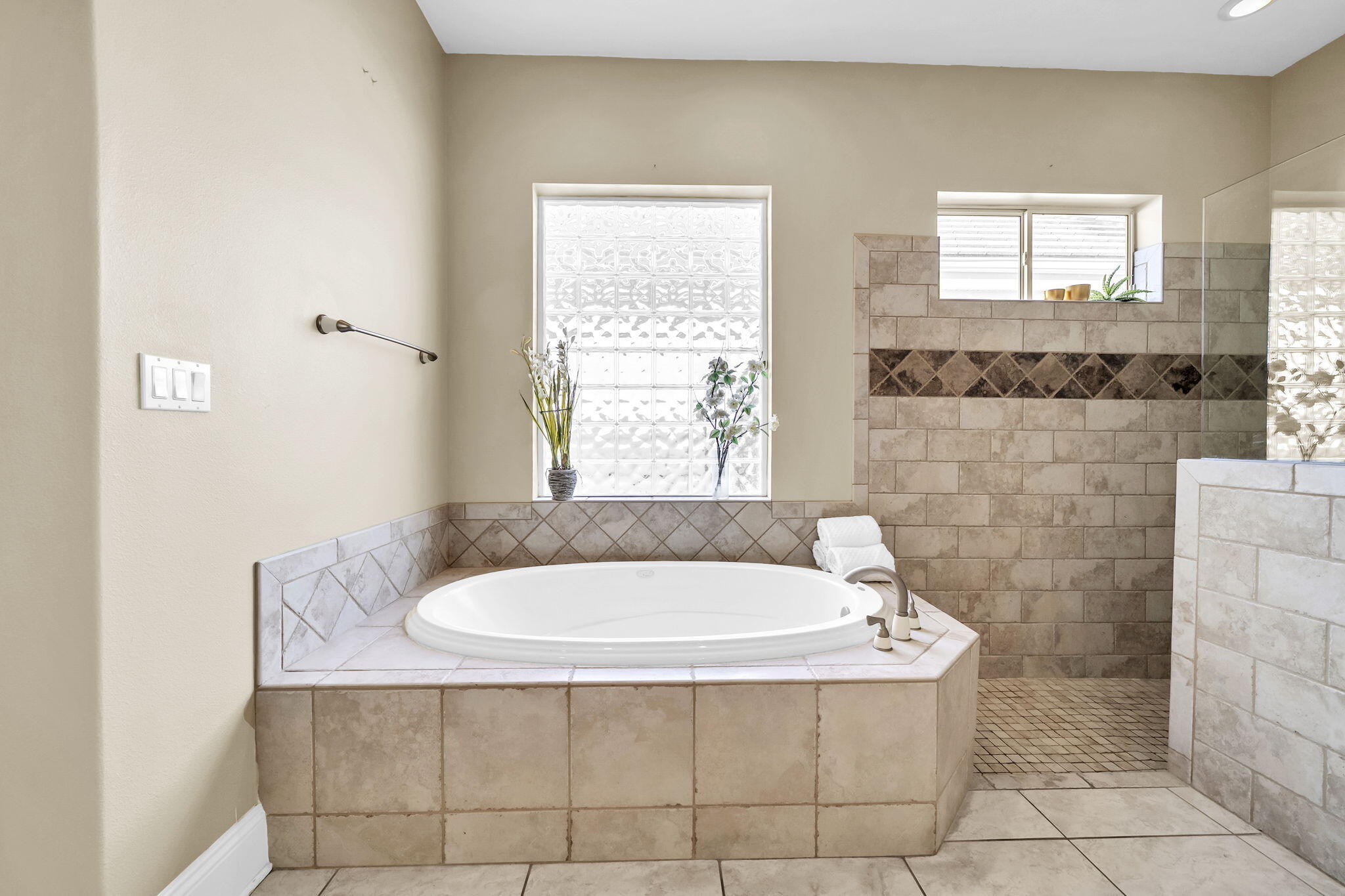 4595 Sailmaker Lane Destin, FL 32541 - Photo 26 of 50 a bath tub sitting in a bathroom next to a window