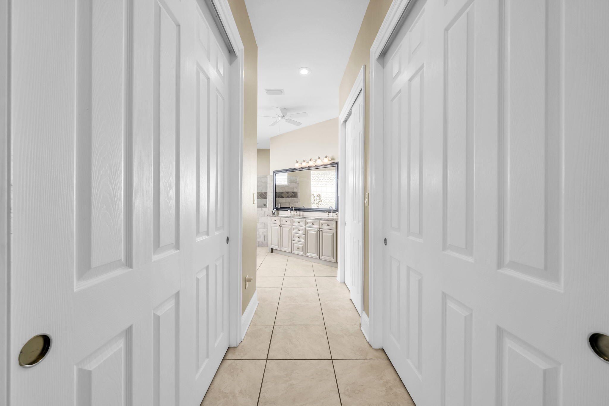 4595 Sailmaker Lane Destin, FL 32541 - Photo 27 of 50 a view of a hallway with windows