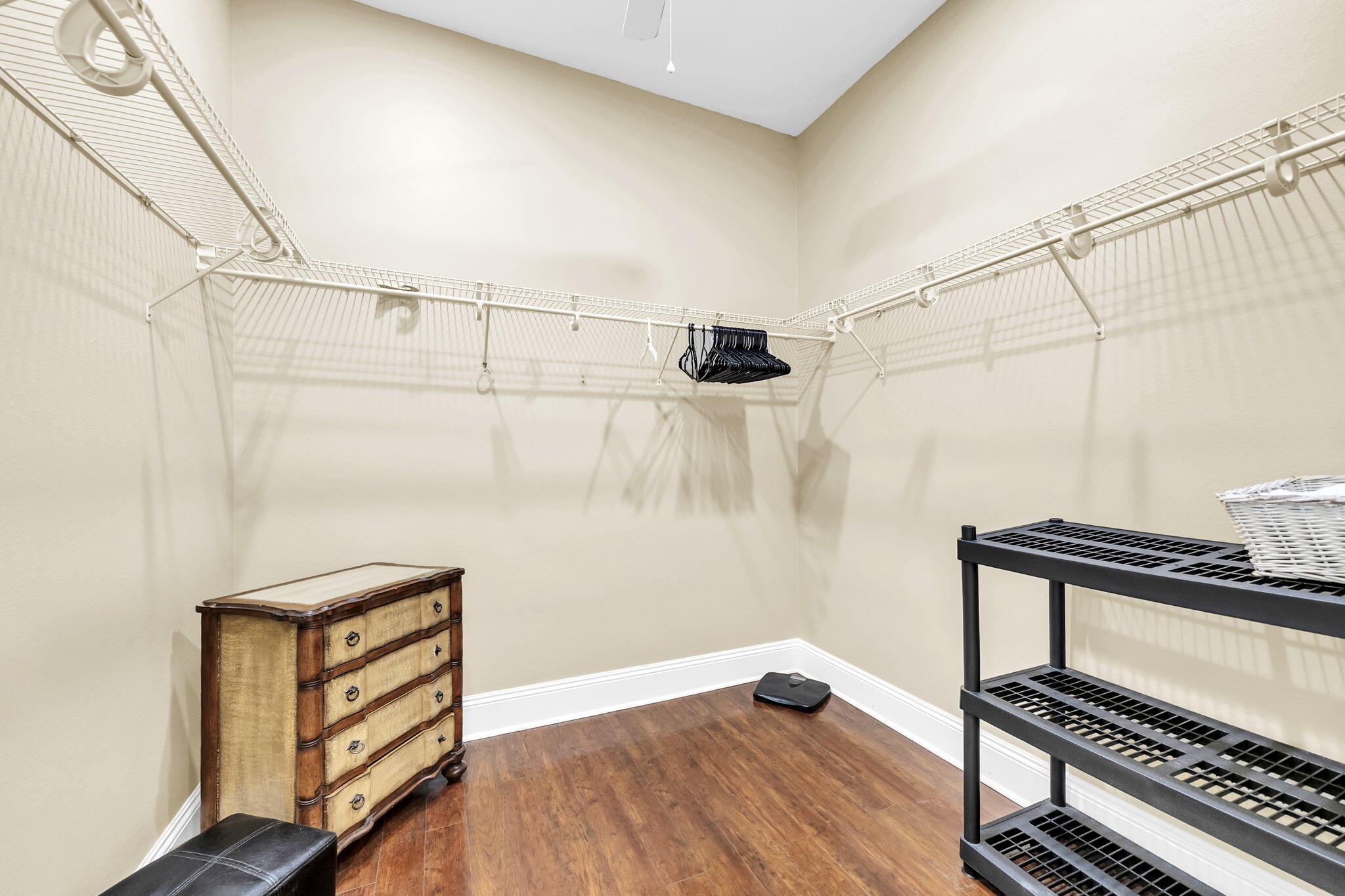 4595 Sailmaker Lane Destin, FL 32541 - Photo 29 of 50 a view of walk in closet with empty racks