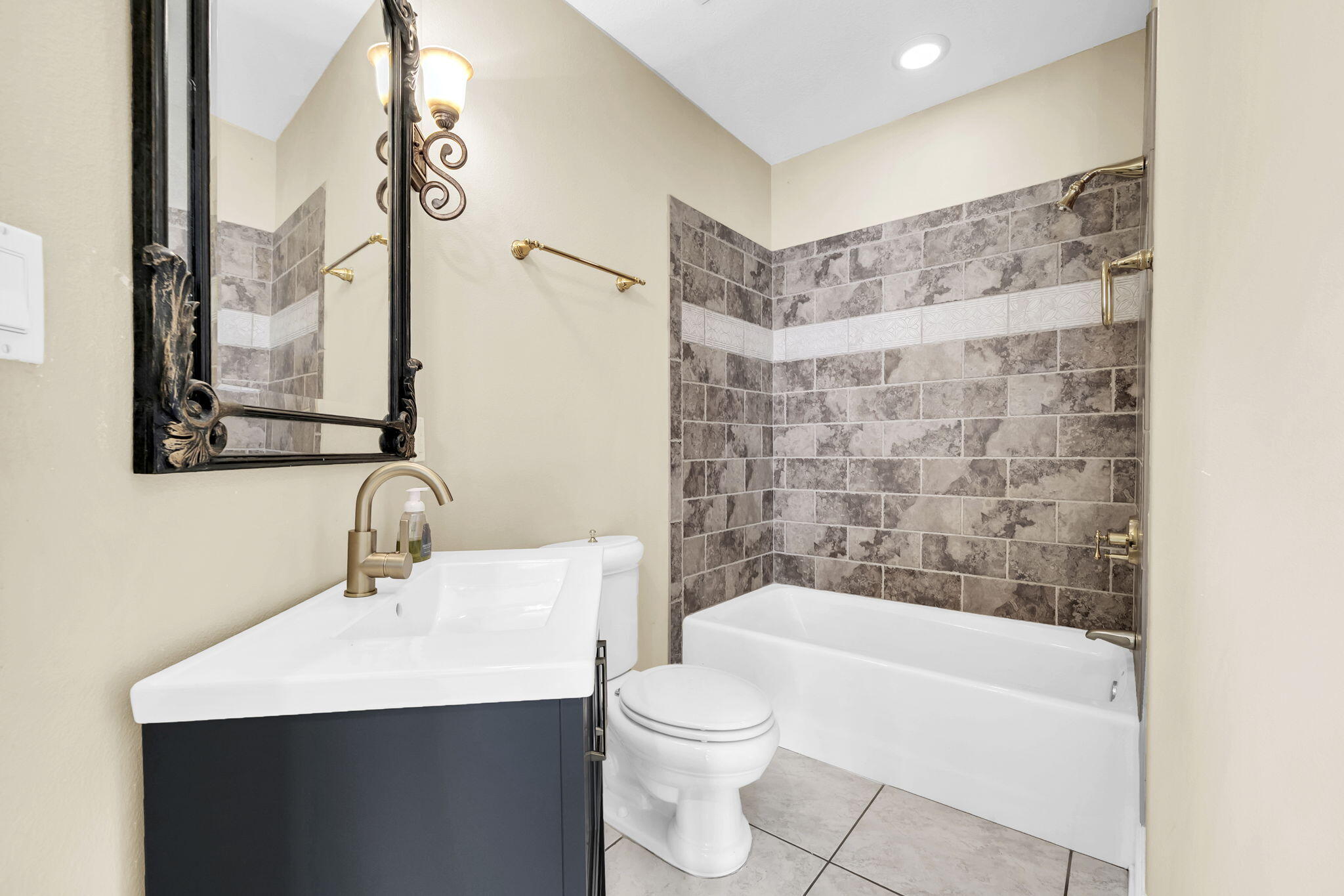 4595 Sailmaker Lane Destin, FL 32541 - Photo 33 of 50 a bathroom with a sink a toilet and shower