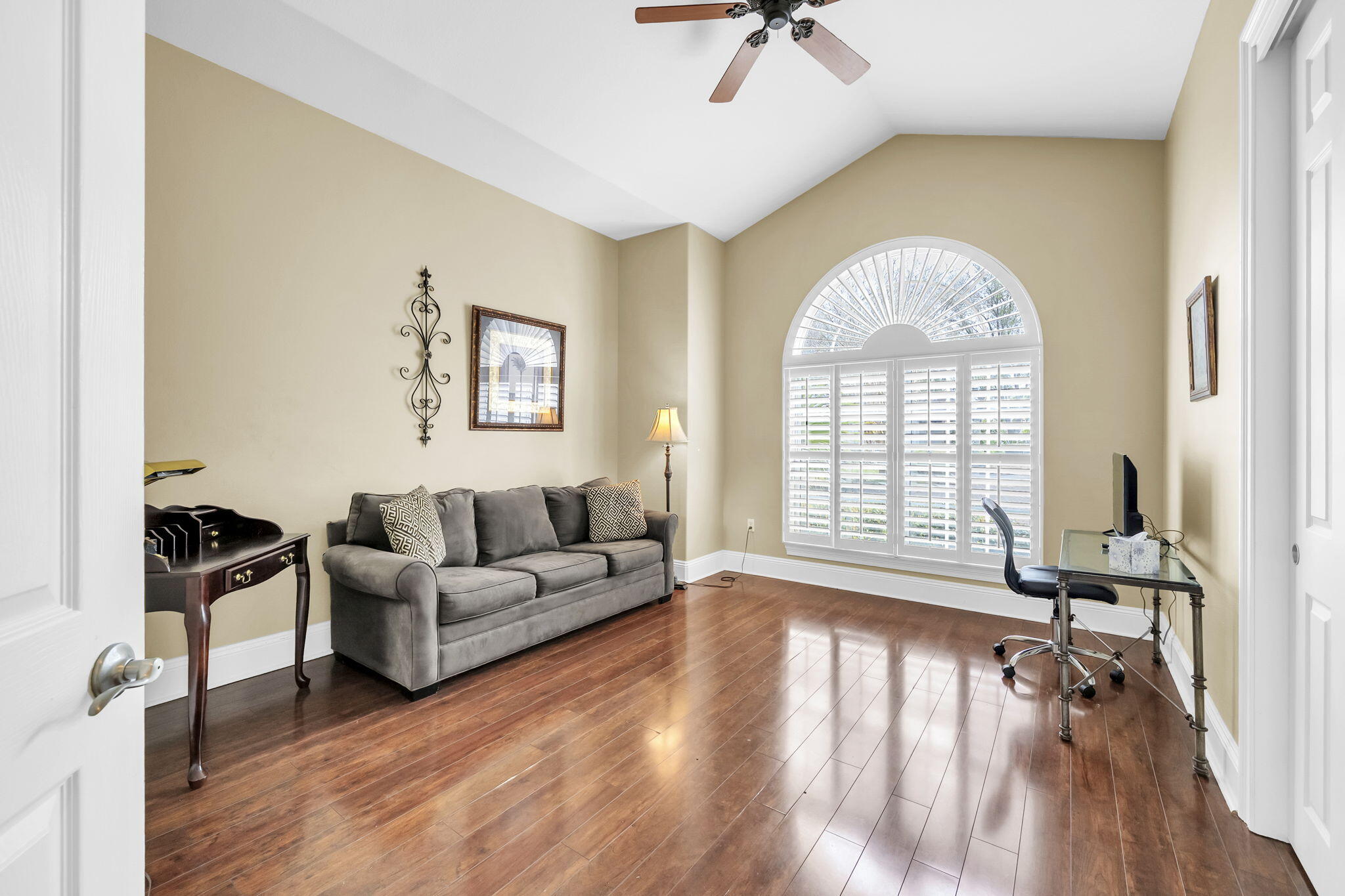 4595 Sailmaker Lane Destin, FL 32541 - Photo 35 of 50 a living room with furniture and a wooden floor