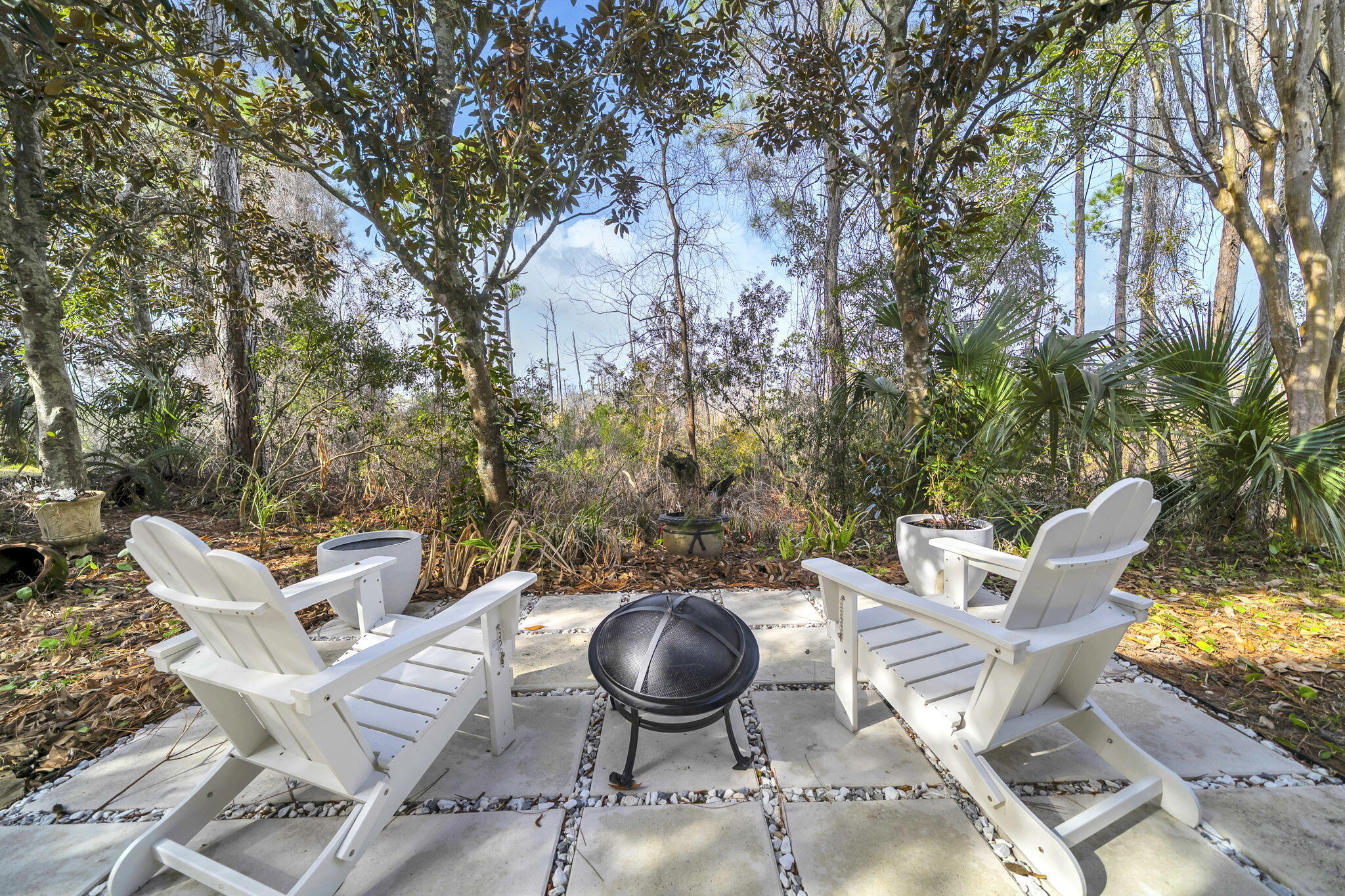 4595 Sailmaker Lane Destin, FL 32541 - Photo 47 of 50 a view of a chairs and table in the patio