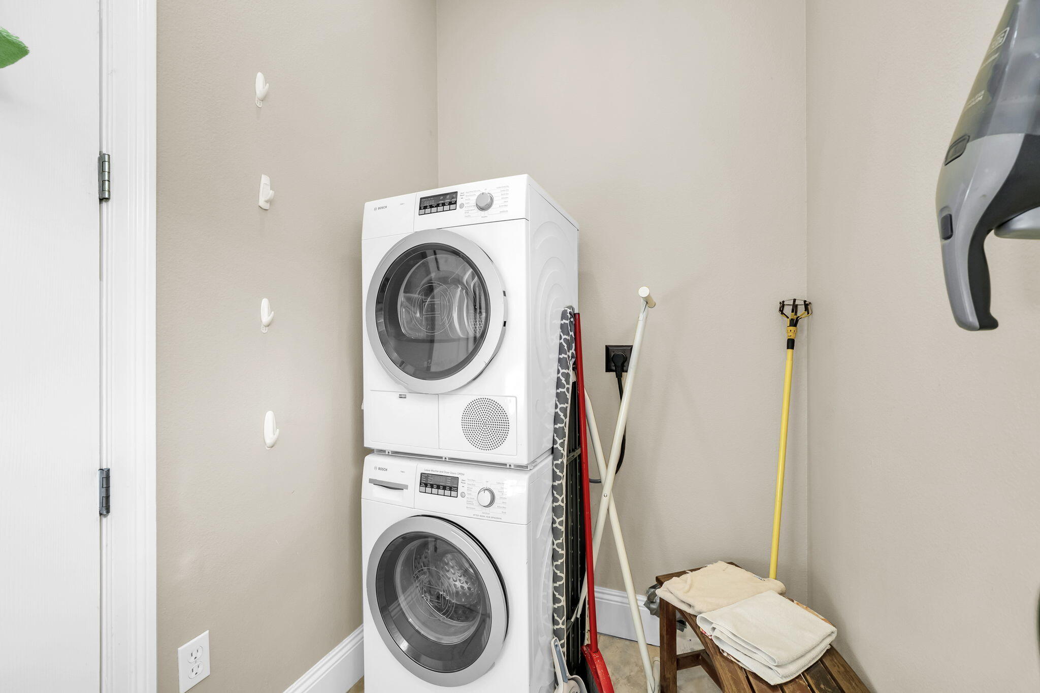 4595 Sailmaker Lane Destin, FL 32541 - Photo 49 of 50 a utility room with dryer and washer