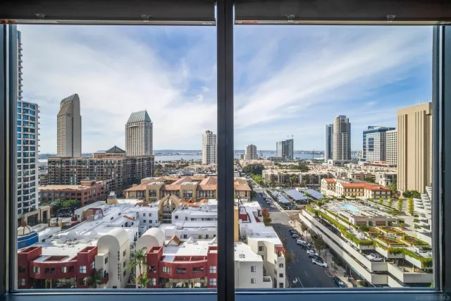 a city view from a balcony with city view
