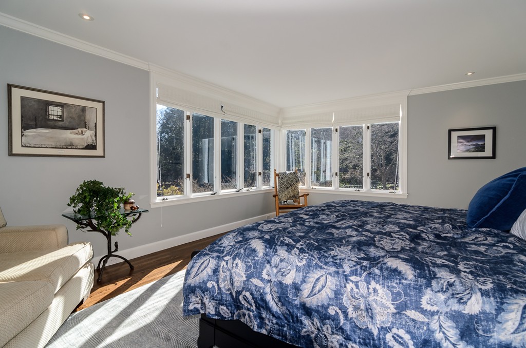 21 Carisbrooke Road Wellesley, MA 02481 - Photo 13 of 18 a bedroom with a bed and a large window