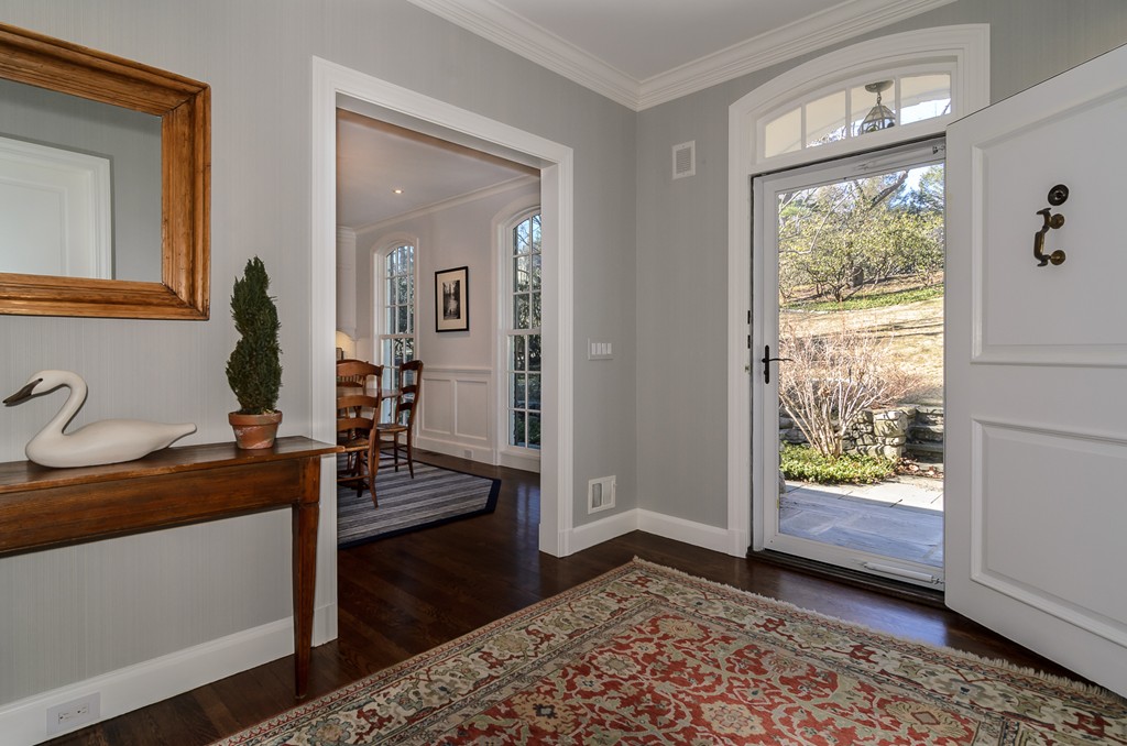 21 Carisbrooke Road Wellesley, MA 02481 - Photo 2 of 18 a bedroom with a bed and wooden floor