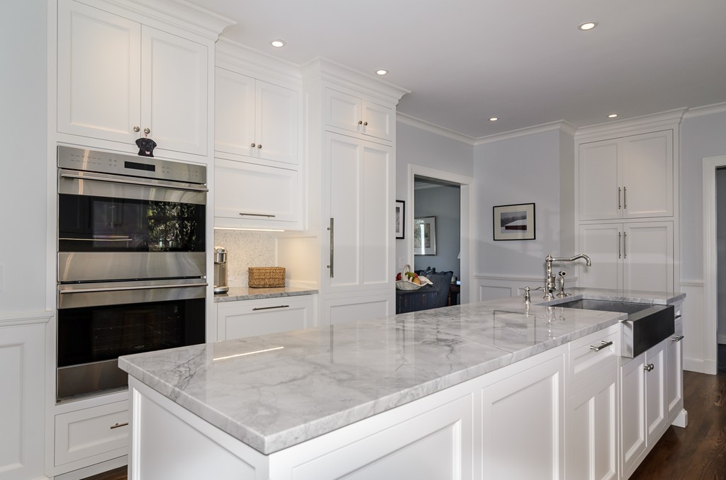 21 Carisbrooke Road Wellesley, MA 02481 - Photo 4 of 18 a kitchen with a sink stove and refrigerator