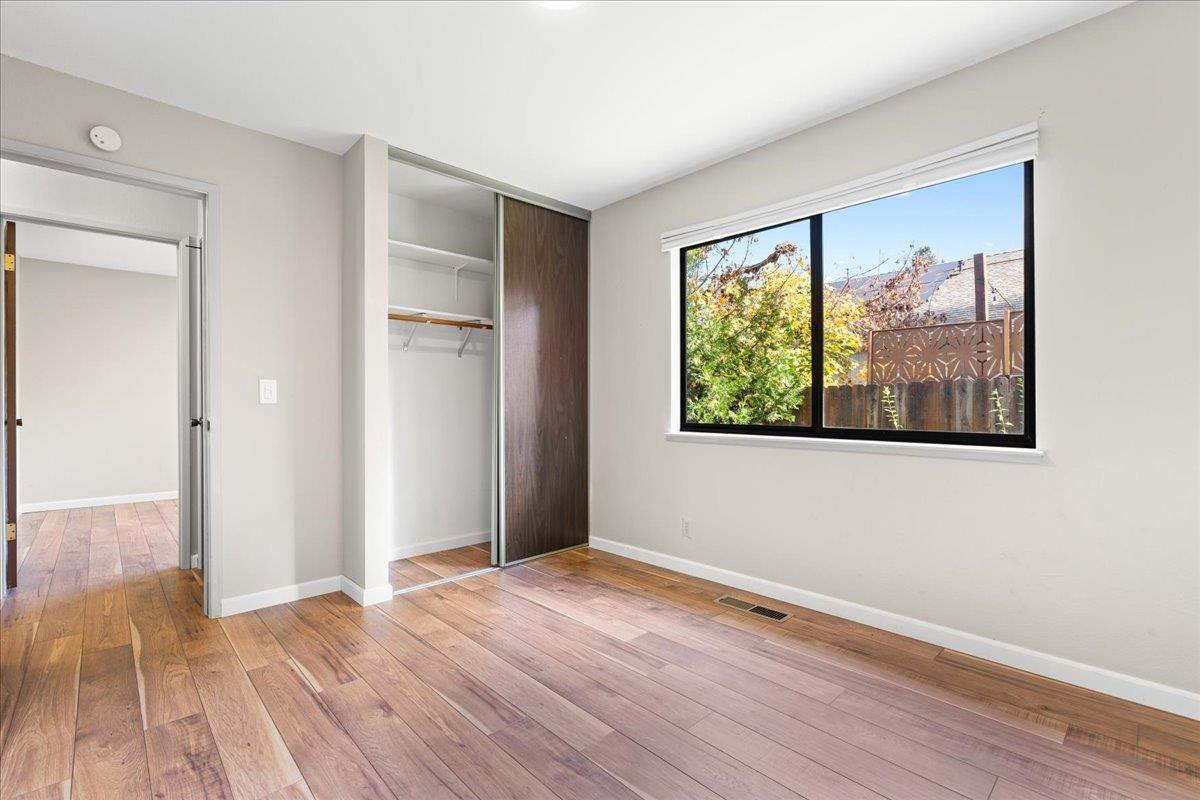 561 Blight Road Grass Valley, CA 95945 - Photo 24 of 44 a view of an empty room with wooden floor and a window