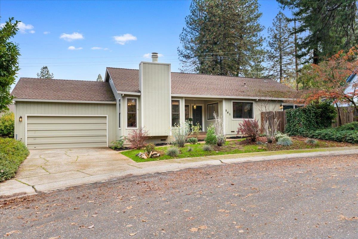 561 Blight Road Grass Valley, CA 95945 - Photo 26 of 44 a front view of a house with a yard and garage