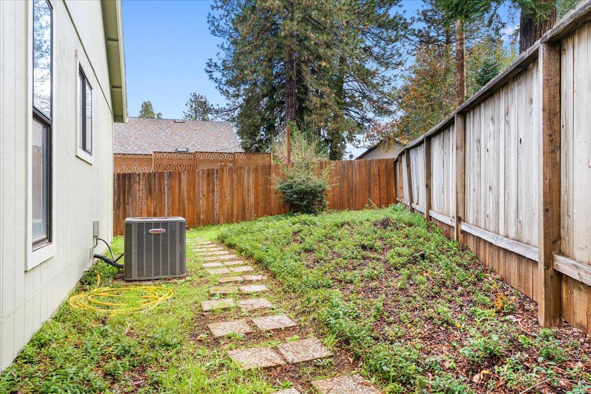 561 Blight Road Grass Valley, CA 95945 - Photo 31 of 44 a backyard of a house with lots of green space