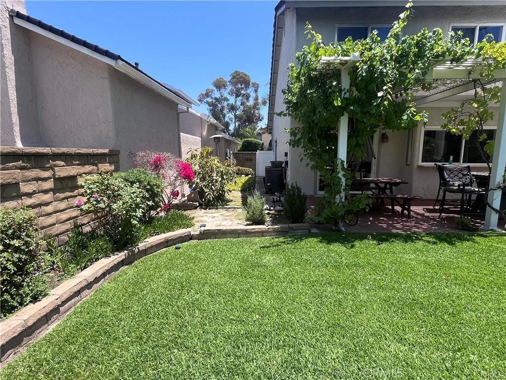 21681 Cabrosa Mission Viejo, CA 92691 - Photo 12 of 22 a front view of a house with a yard