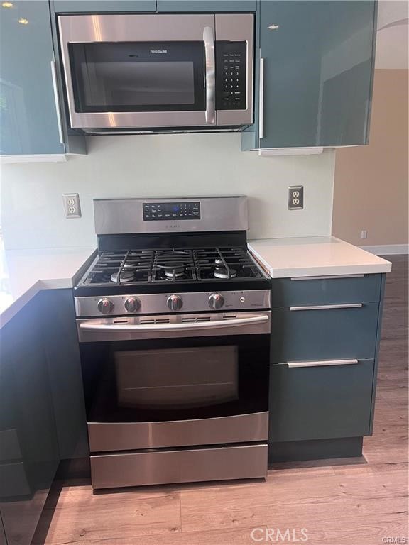 21681 Cabrosa Mission Viejo, CA 92691 - Photo 7 of 22 a stove top oven sitting inside of a kitchen