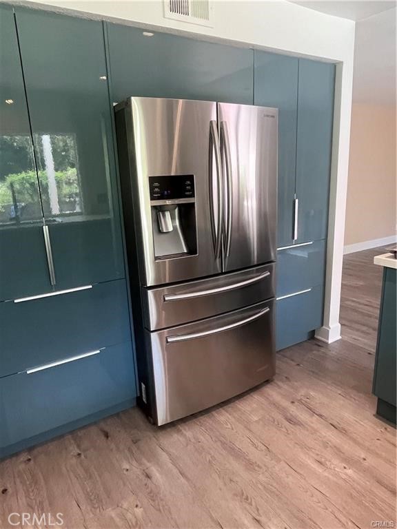 21681 Cabrosa Mission Viejo, CA 92691 - Photo 8 of 22 a metallic refrigerator freezer sitting in a kitchen