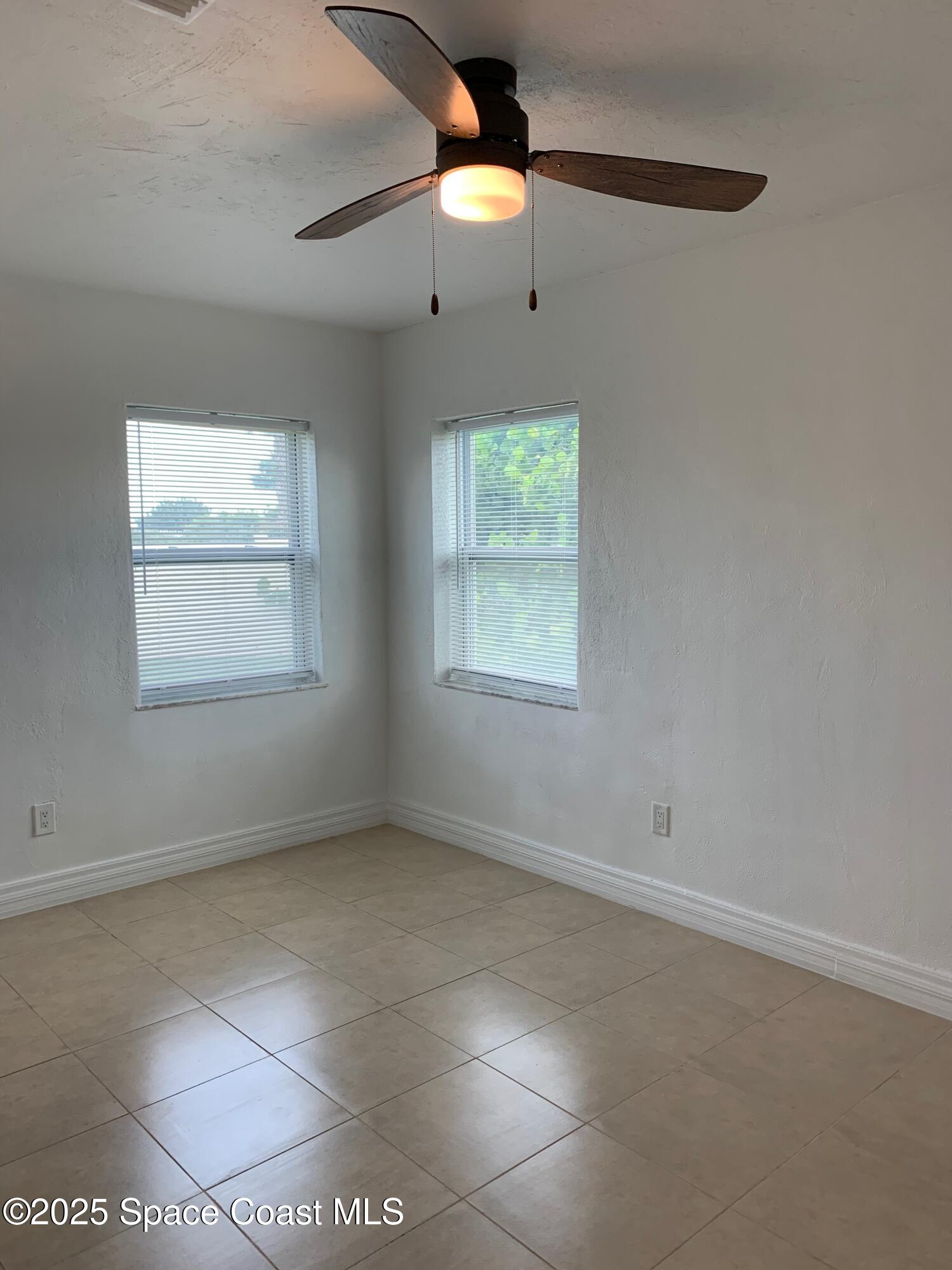 110 Del Flora Indialantic, FL 32903 - Photo 13 of 33 an empty room with a window