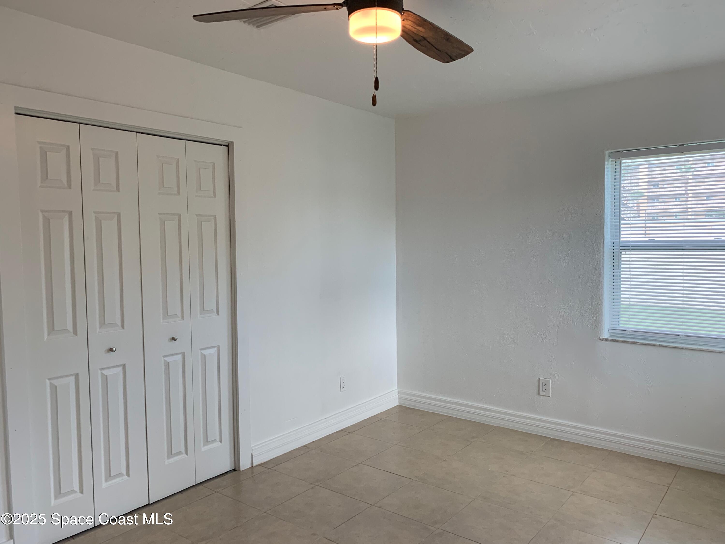 110 Del Flora Indialantic, FL 32903 - Photo 14 of 33 an empty room with a window