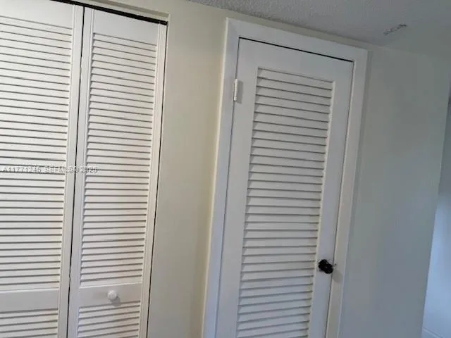 a view of a room that has a window in it