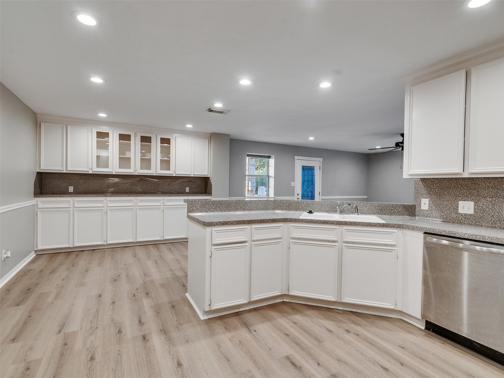 7301 Pearson Road Santa Fe, TX 77517 - Photo 19 of 46 a kitchen with stainless steel appliances granite countertop a sink and cabinets