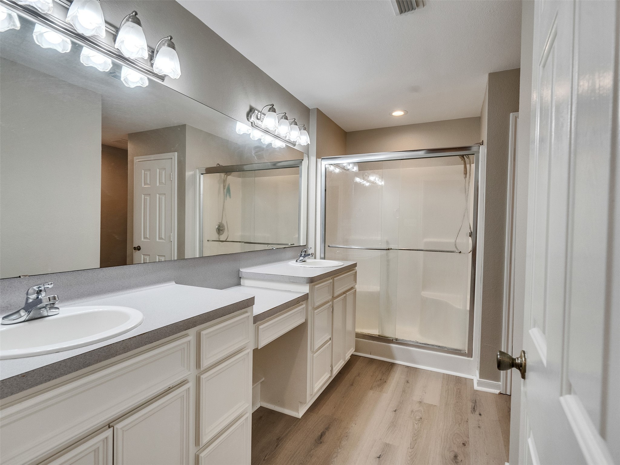 7301 Pearson Road Santa Fe, TX 77517 - Photo 27 of 46 a bathroom with a sink a vanity a mirror and a shower