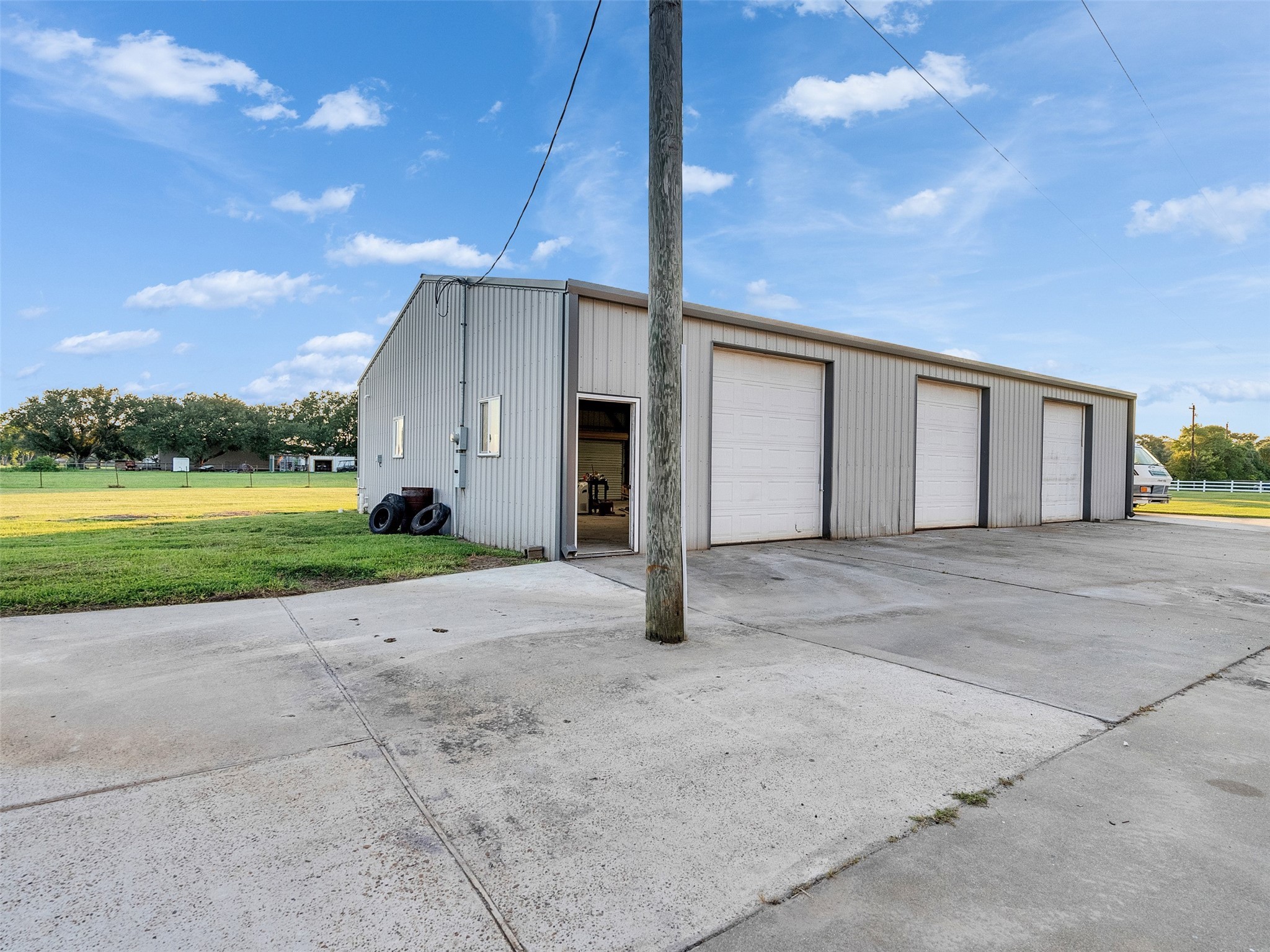 7301 Pearson Road Santa Fe, TX 77517 - Photo 38 of 46 a view of a house with a yard and garage