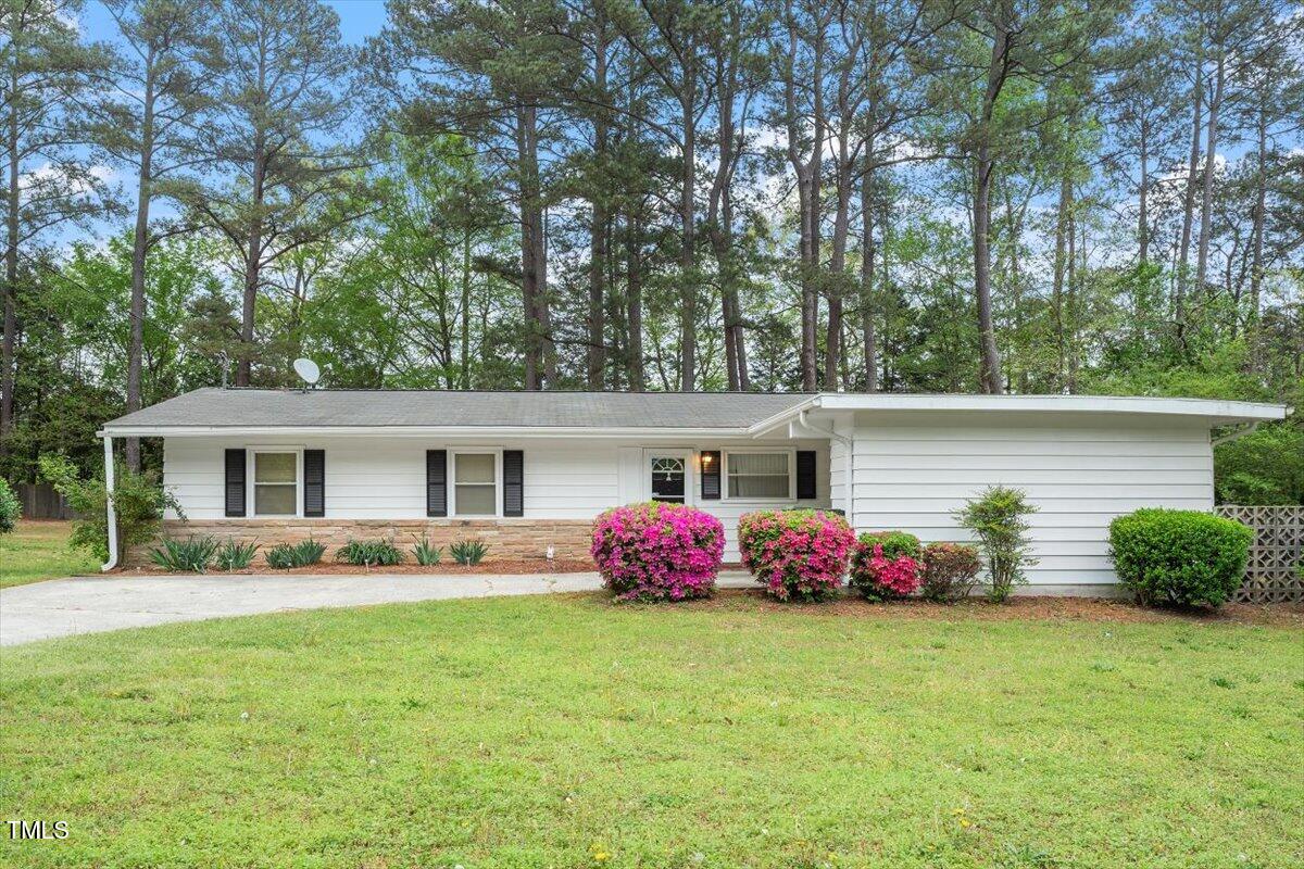 911 Williams Road Raleigh, NC 27610 - Photo 1 of 33 a front view of house with yard and green space
