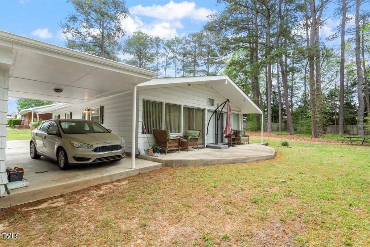 911 Williams Road Raleigh, NC 27610 - Photo 12 of 33 a view of a car parked in front of house