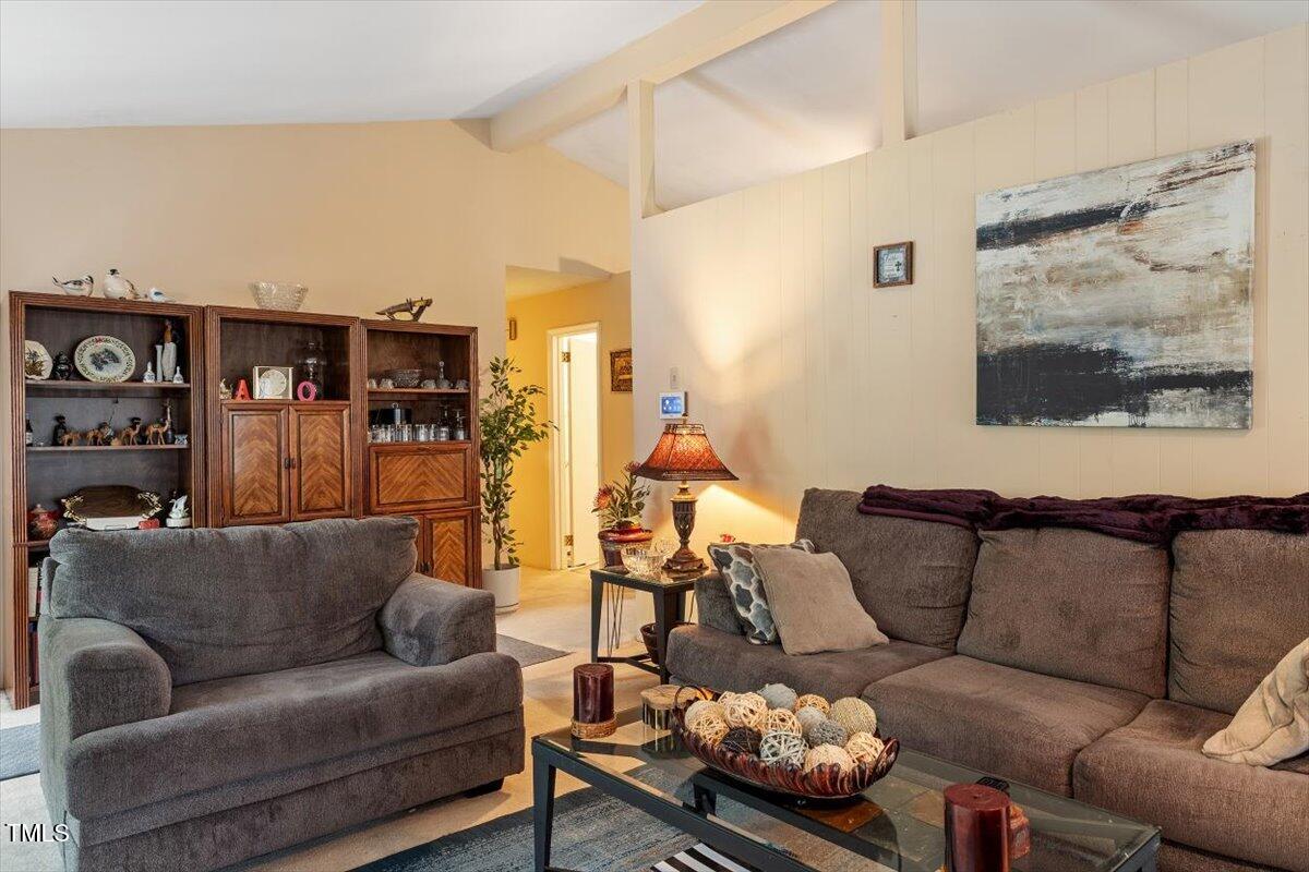 911 Williams Road Raleigh, NC 27610 - Photo 15 of 33 a living room with furniture and a couch