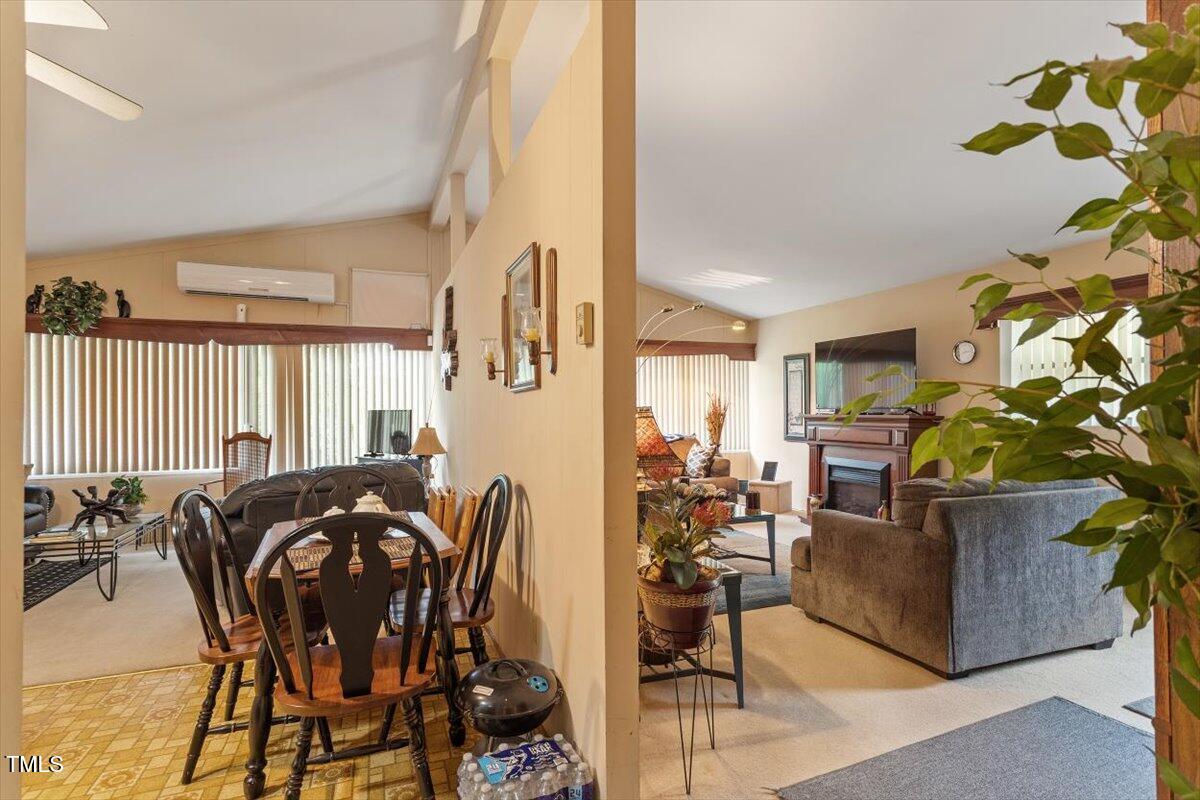911 Williams Road Raleigh, NC 27610 - Photo 17 of 33 a view of a dining room with furniture