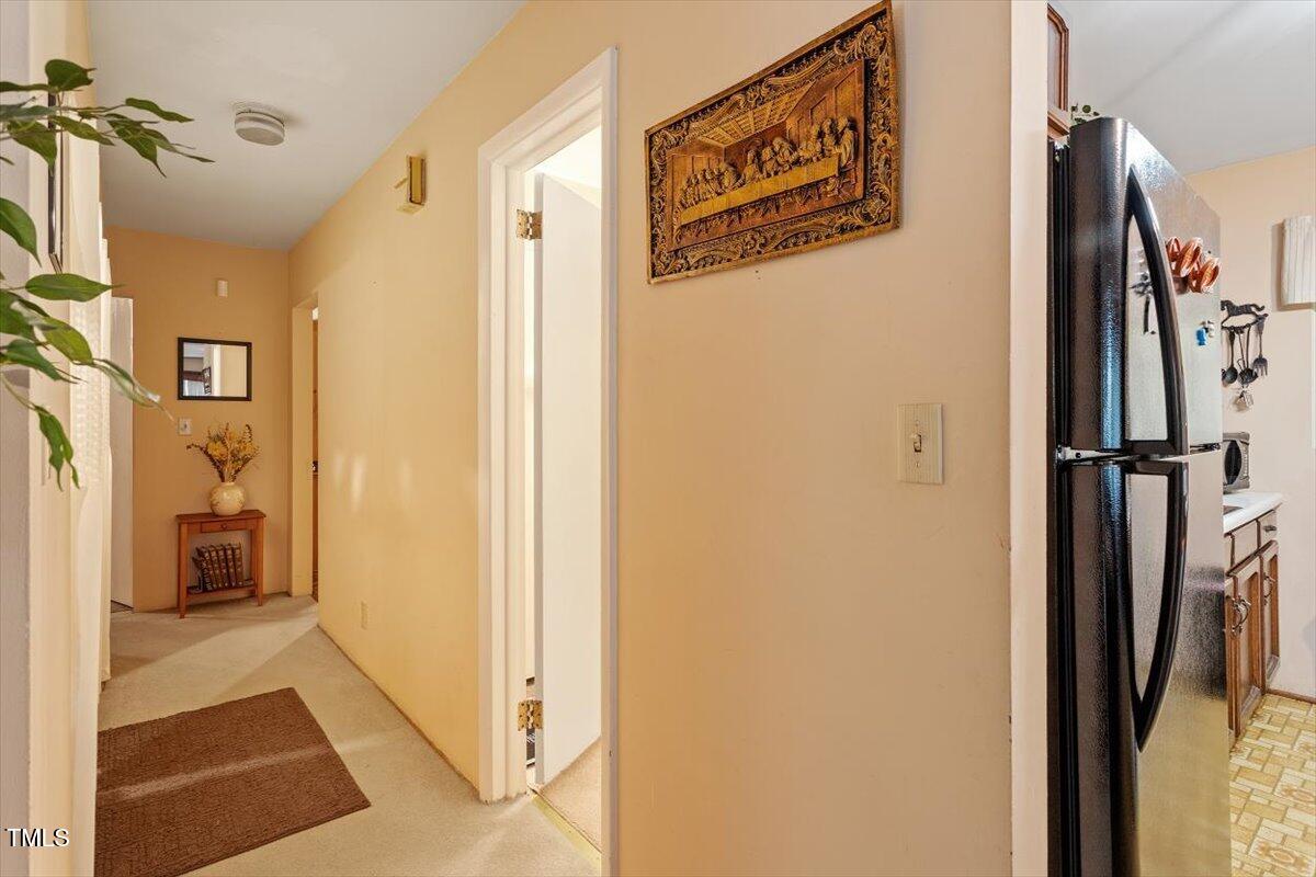 911 Williams Road Raleigh, NC 27610 - Photo 24 of 33 a view of a hallway with a elevator