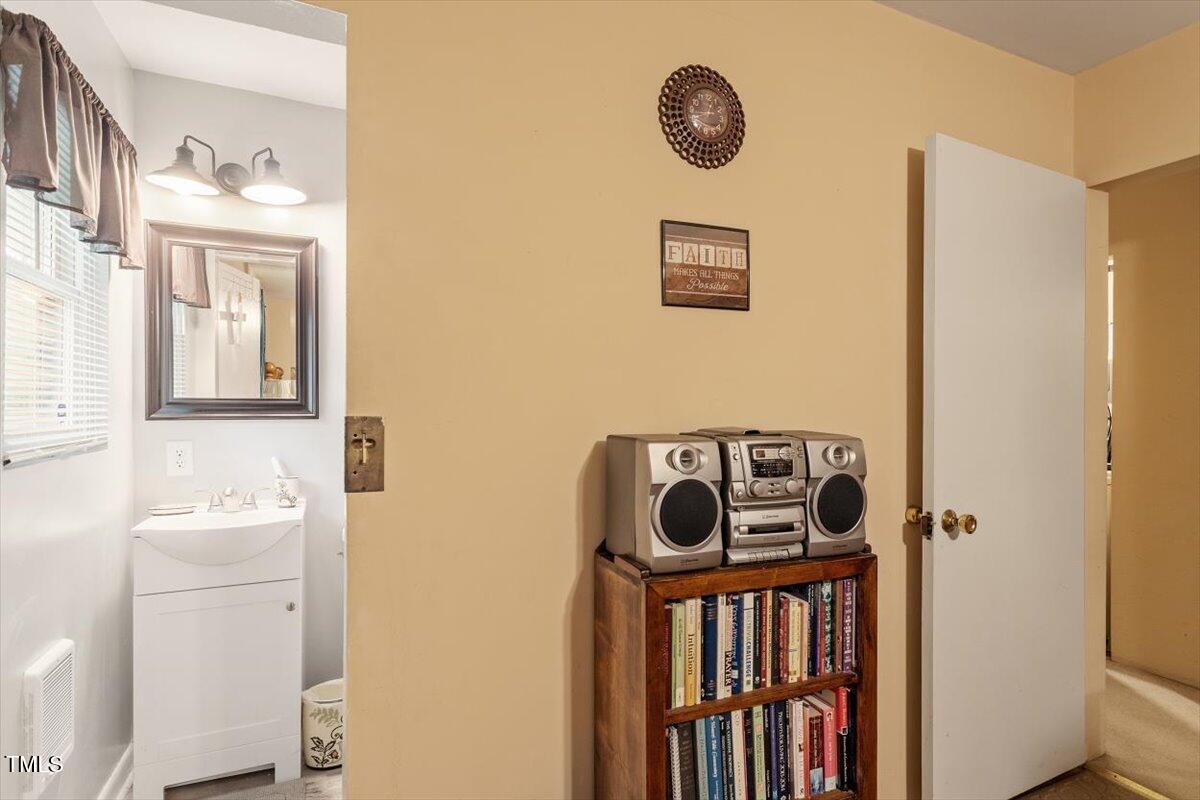 911 Williams Road Raleigh, NC 27610 - Photo 30 of 33 a view of an entryway with wooden floor