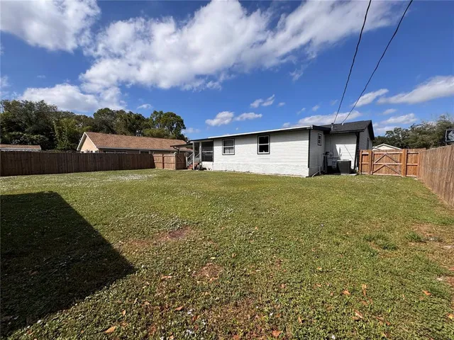 a large house with a yard