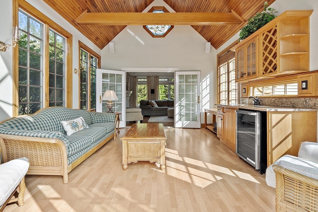 106 Fox Run Road Bolton, MA 01740 - Photo 13 of 41 a living room with a couch and a table