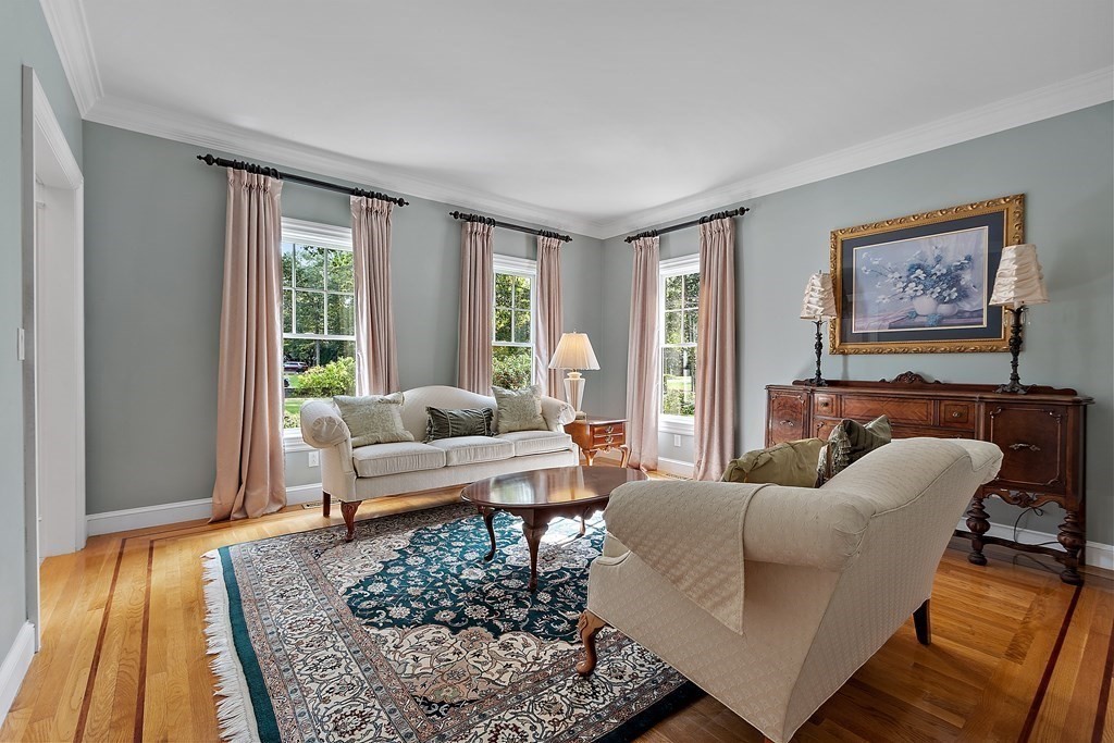 106 Fox Run Road Bolton, MA 01740 - Photo 16 of 41 a living room with furniture and a rug