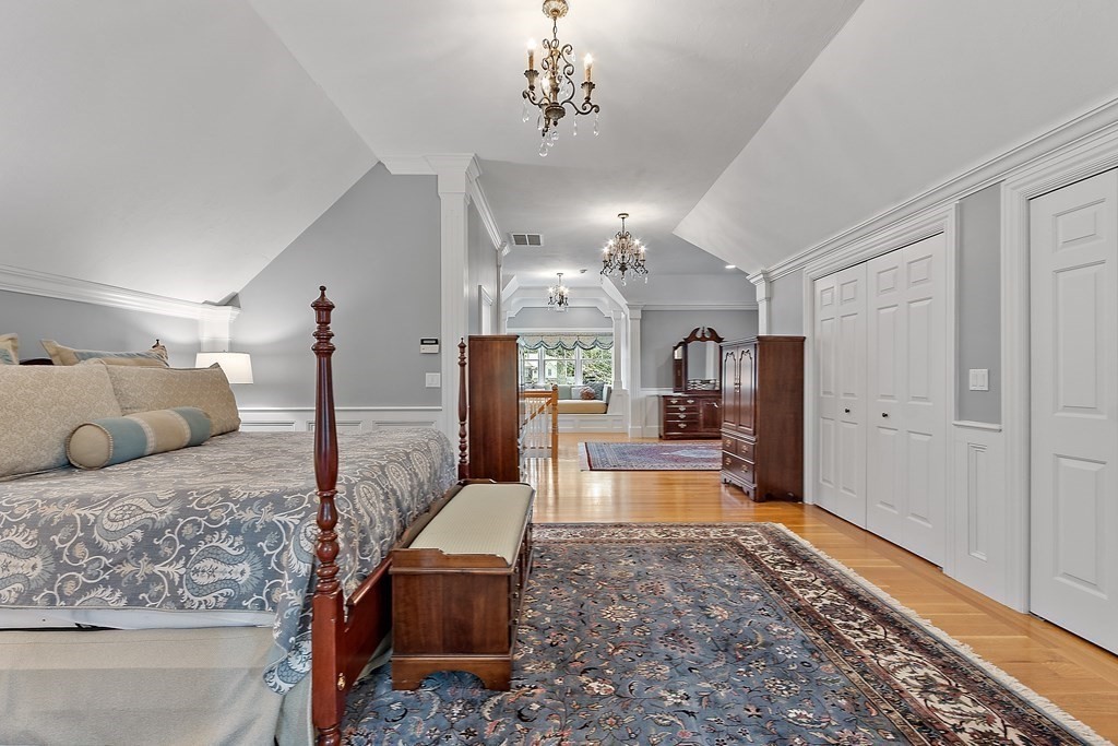 106 Fox Run Road Bolton, MA 01740 - Photo 23 of 41 a living room with furniture and a wooden floor