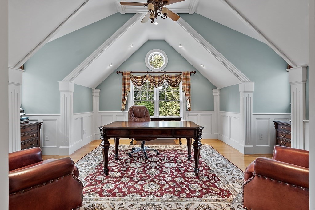 106 Fox Run Road Bolton, MA 01740 - Photo 26 of 41 a living room with furniture and a clock