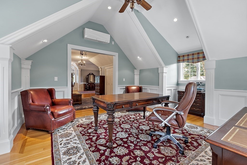 106 Fox Run Road Bolton, MA 01740 - Photo 27 of 41 a living room with furniture and a fireplace