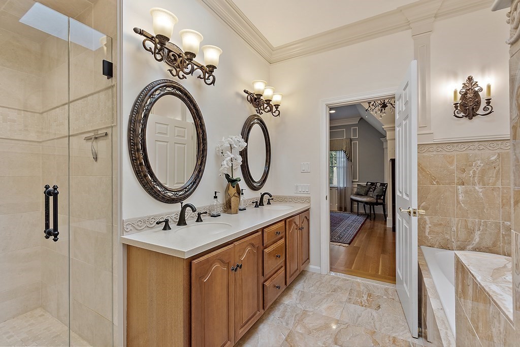 106 Fox Run Road Bolton, MA 01740 - Photo 28 of 41 a bathroom with a double vanity sink mirror and bathtub